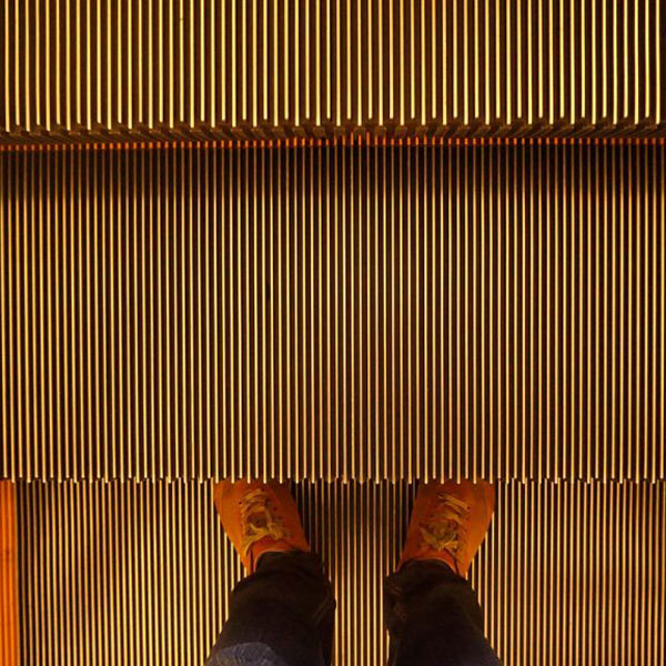 feet on escalator