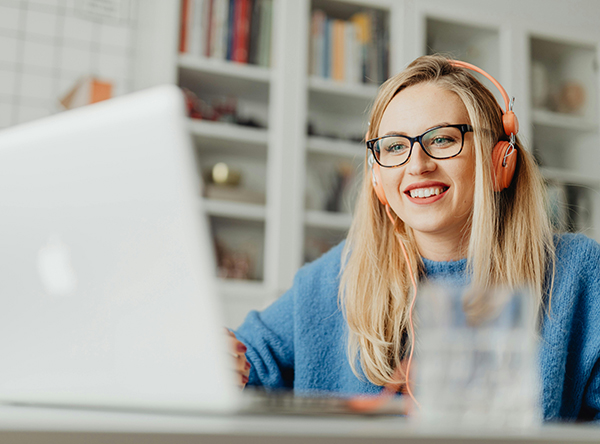 a person looks at a laptop screen