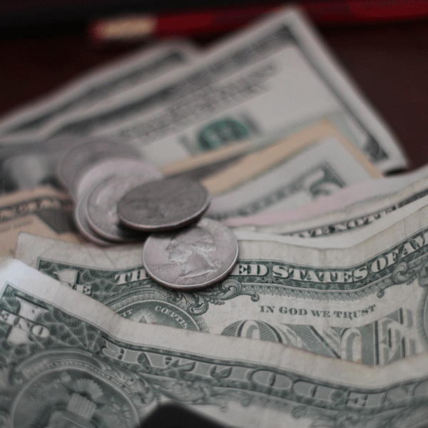 dollar bills and quarters