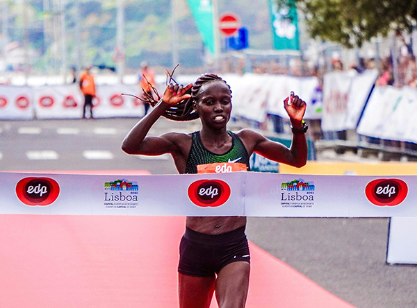 A person crosses the finish line at a race